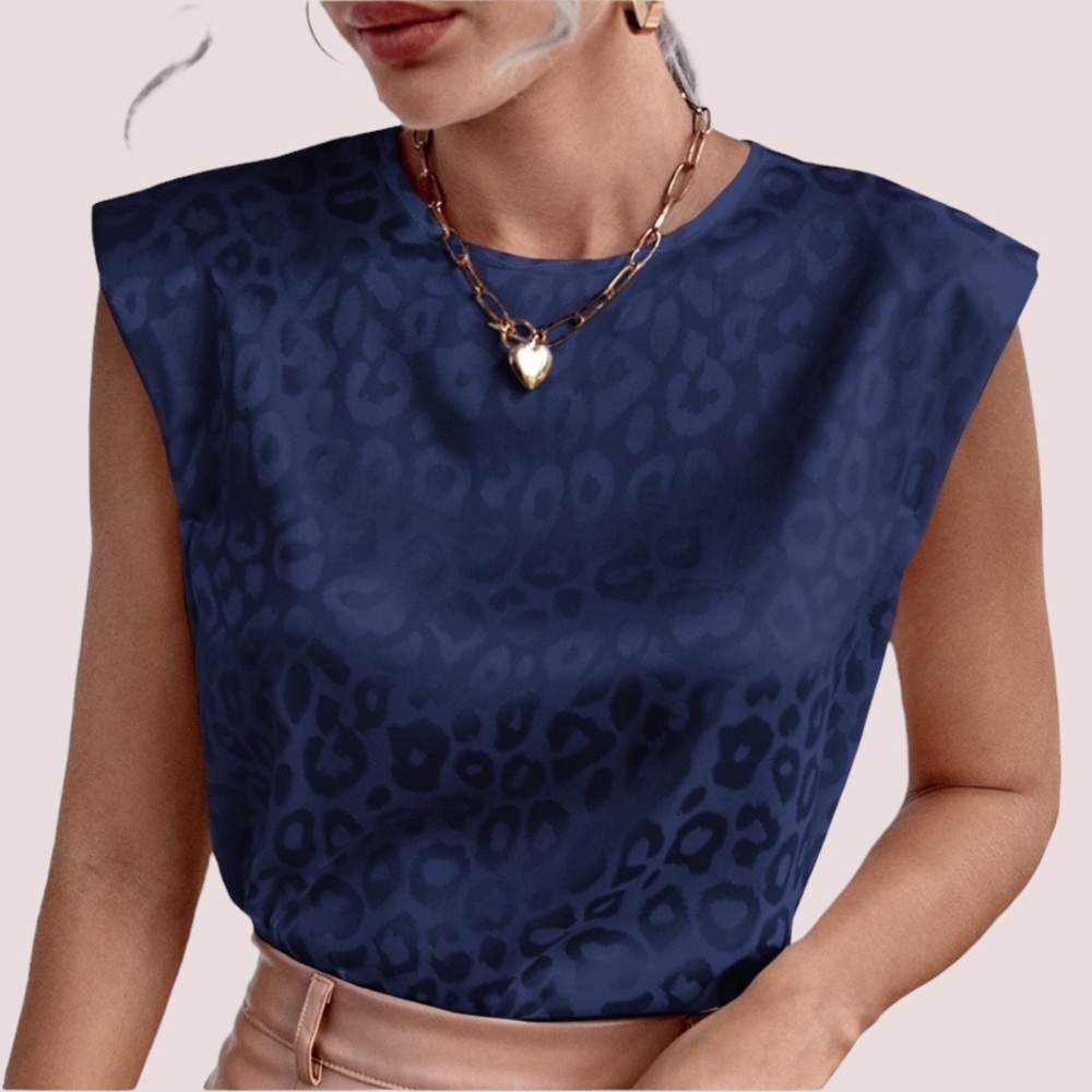 BRAND NEW leopard padded shoulder blouse